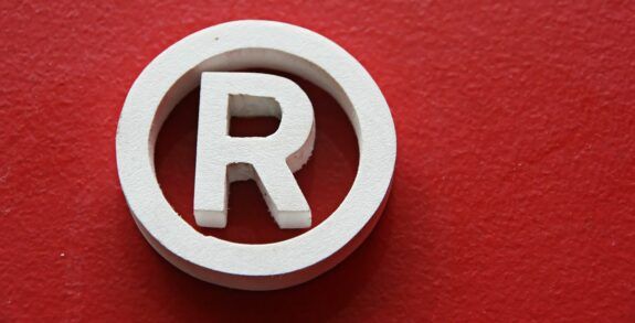 Why is trademark registration crucial in developing your mobile app